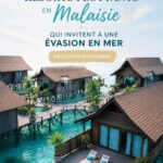 Vue panoramique d'un resort flottant en Malaisie avec des eaux cristallines.