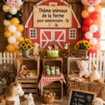 Fête d'anniversaire sur le thème des animaux de la ferme avec une décoration colorée et accueillante.