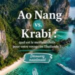 Plage paisible d'Ao Nang avec des eaux turquoise et des montagnes en arrière-plan.