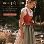 Femme portant un dirndl traditionnel bavarois dans un cadre alpin.