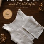 Costume dirndl traditionnel avec motifs colorés, prêt pour l'Oktoberfest.