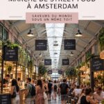Vue du marché couvert Foodhallen à Amsterdam avec divers stands de street food.