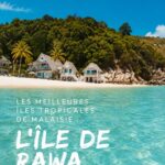 Plage de Rawa Island avec un ciel bleu clair et des eaux cristallines, une destination tropicale rêvée.