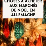 Marché de Noël en Allemagne avec des lumières scintillantes et des stands de produits artisanaux.