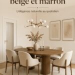 Une salle à manger moderne avec des murs beige et du mobilier brun, offrant une ambiance chaleureuse.
